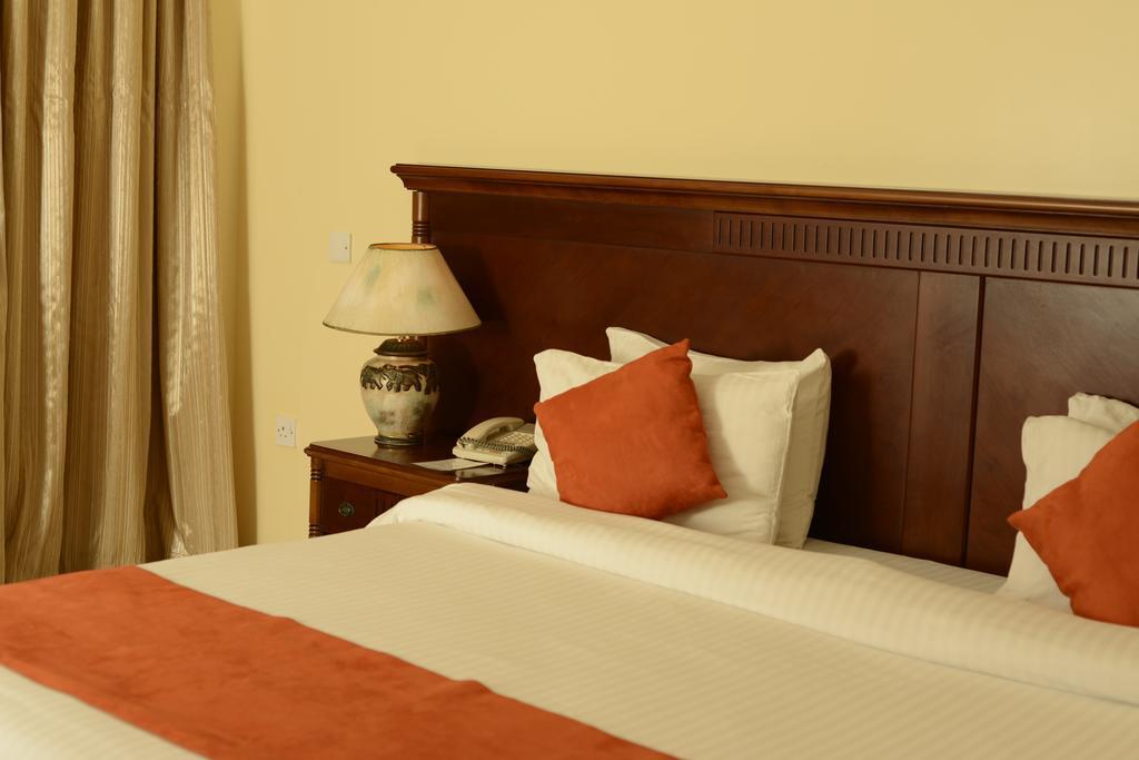 Golden Tulip Dar Es Salaam Hotel Room photo