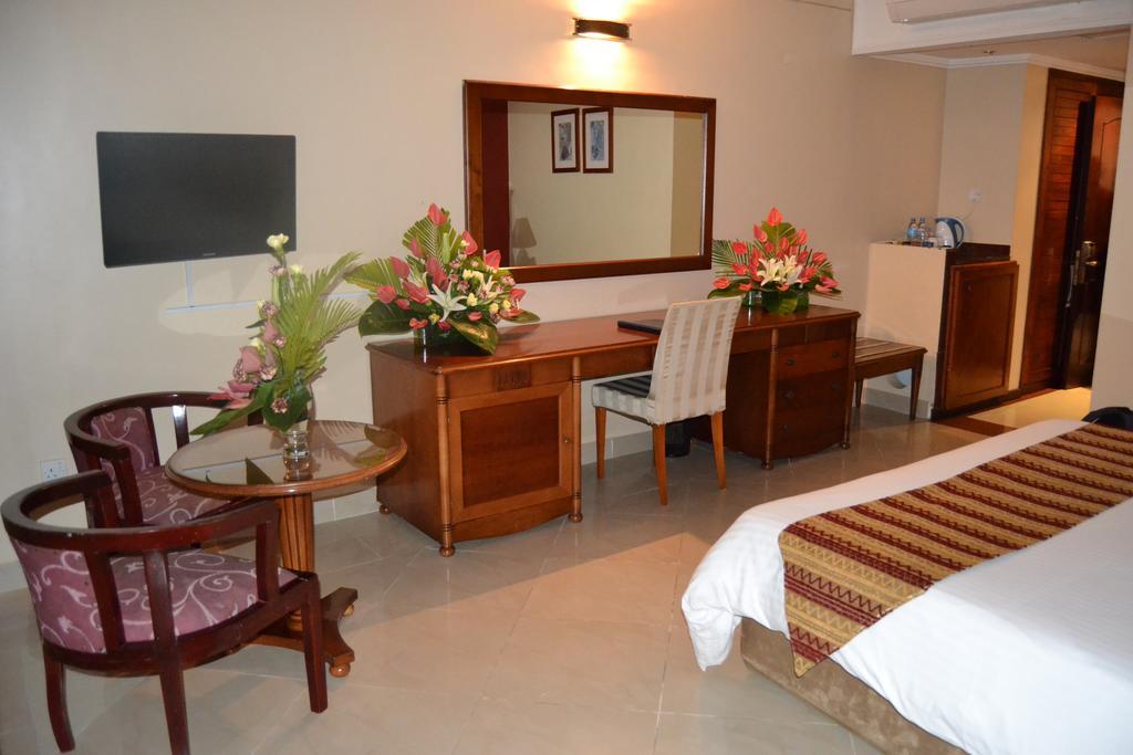 Golden Tulip Dar Es Salaam Hotel Room photo
